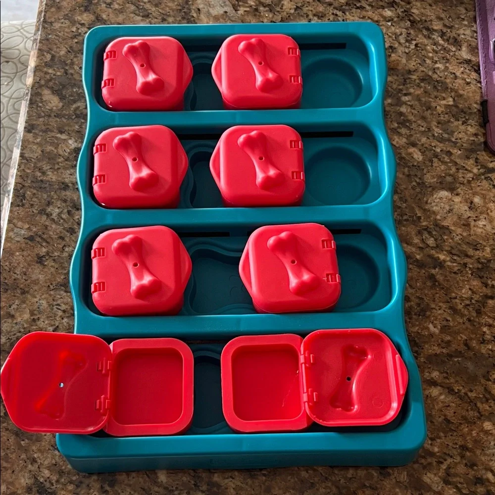 Teal and Red Dog Feeder with Storage Compartments